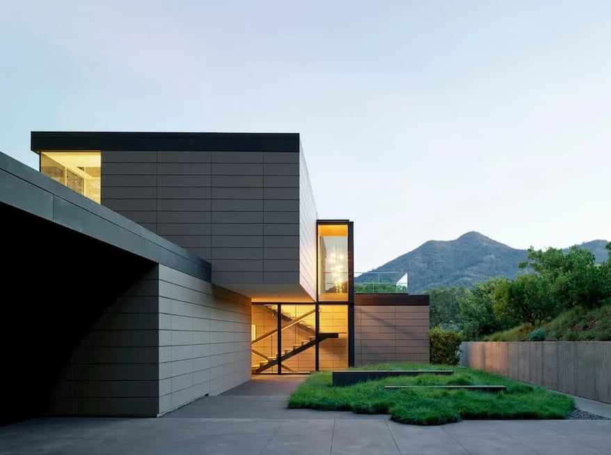 6 Modern Home Exteriors Complemented by Unique Materials Modern home exteriors are often characterized by clean lines, minimalistic design, and a focus on innovative materials. These 6 homes showcase unique materials such as corten steel, glass panels, reclaimed wood, and concrete, creating a striking contrast against their sleek architectural designs. Each home stands out for its bold use of materials, adding a contemporary touch to their exteriors and setting them apart from traditional home styles.